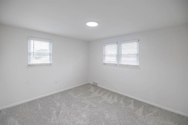 3411 Elmwood St, Erie, PA 16508 - carpeted spare room featuring baseboards