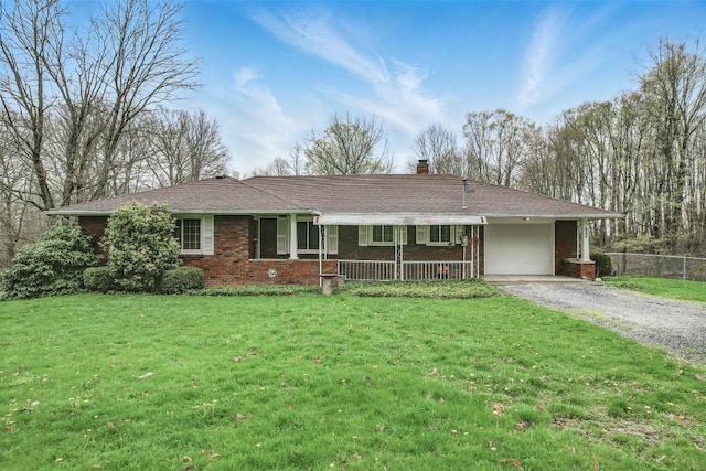 ranch-style home with covered porch, driveway, brick siding, an attached garage, and fence