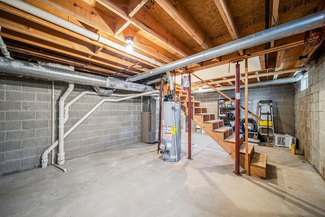 2521 Mccain Ave, Erie, PA 16510 - unfinished basement with stairway and gas water heater