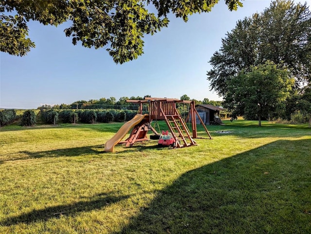 view of play area featuring a lawn