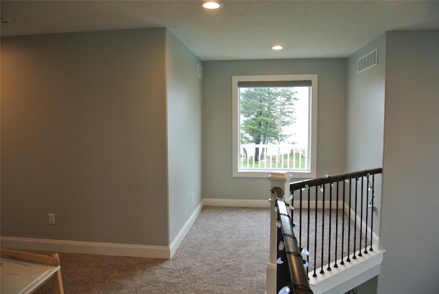 stairway with carpet flooring