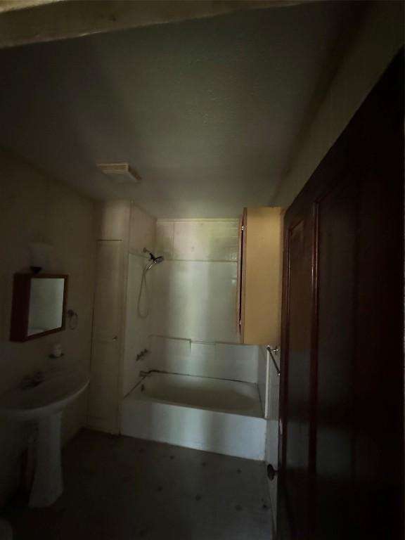 bathroom featuring washtub / shower combination