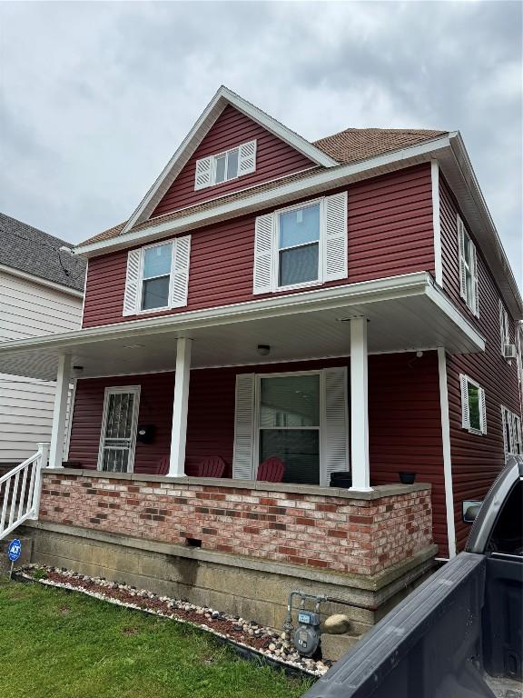549 E 5th St, Erie, PA 16507 - american foursquare style home with covered porch