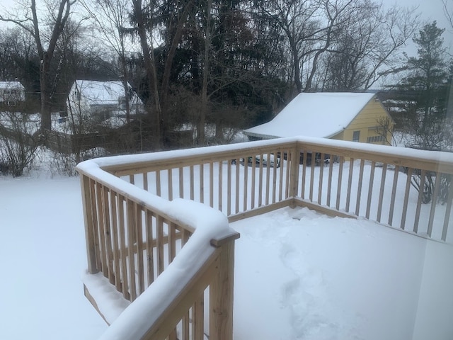 view of snow covered deck