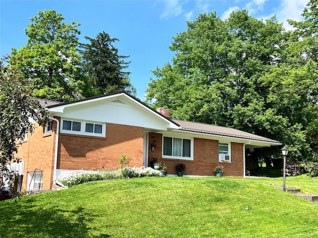 ranch-style home with a front yard