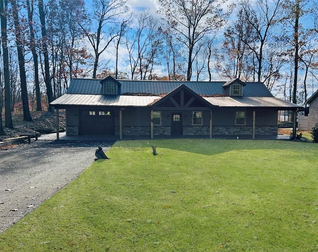 11667 Lakeland Dr, Conneaut Lake, PA 16316 - view of front of property with an attached garage, a front lawn, stone siding, driveway, and metal roof