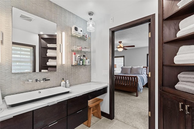 18376 Barber Rd, Meadville, PA 16335 - bathroom with ensuite bath, a ceiling fan, vanity, tile patterned flooring, and decorative backsplash