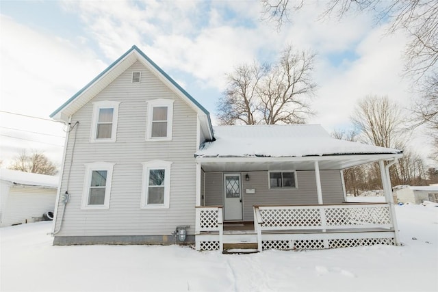 view of snow covered property