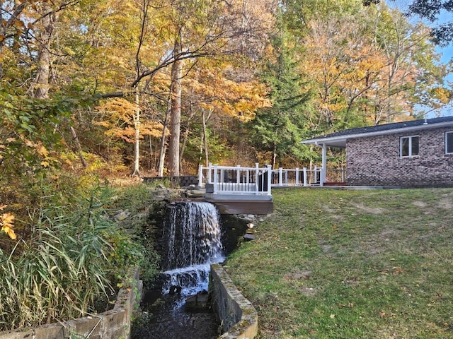 view of yard with a deck