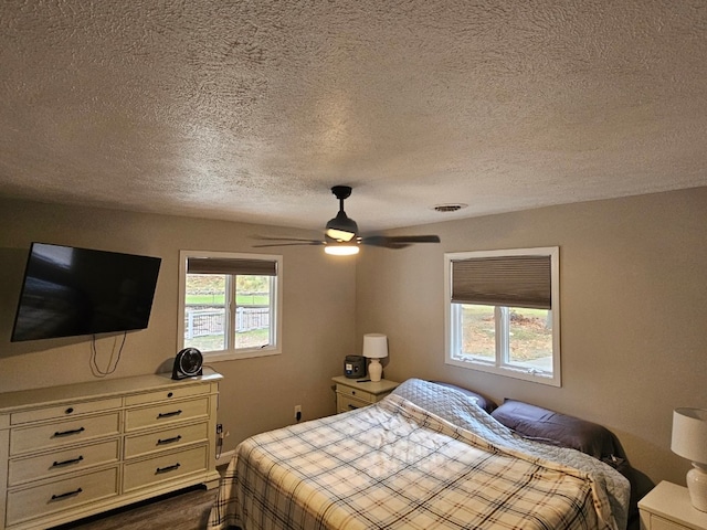 bedroom featuring ceiling fan