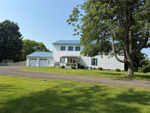 5700 Franklin Rd, Fairview, PA 16415 - traditional-style house featuring an attached garage, a metal roof, and driveway