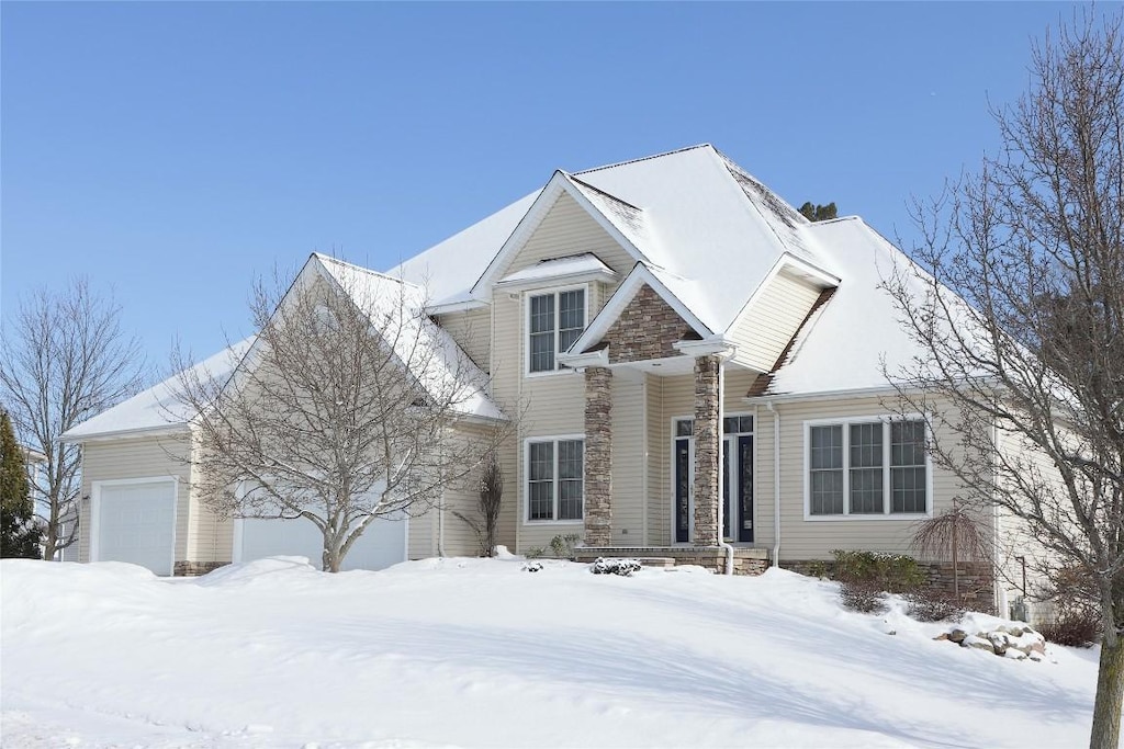 front of property with a garage