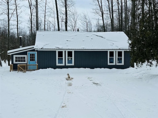 view of snow covered property