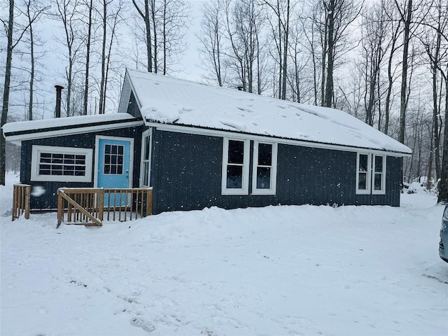 view of snow covered house