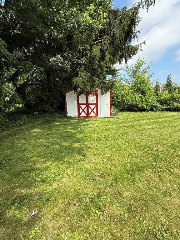3508 Emerson Ave, Erie, PA 16508 - view of green lawn featuring a storage unit