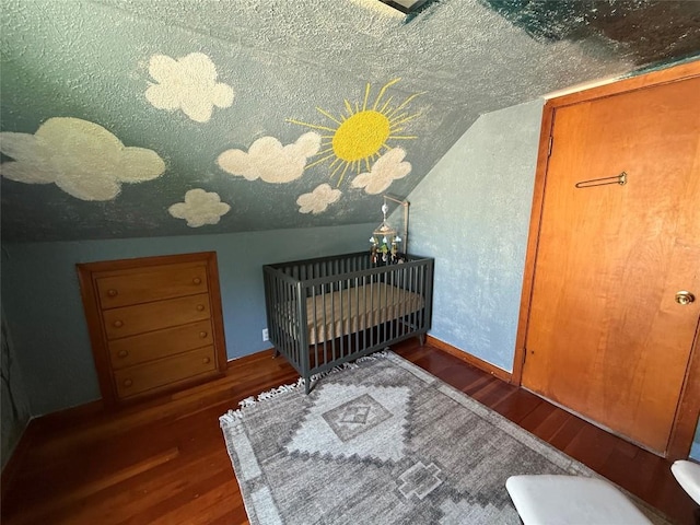 3508 Emerson Ave, Erie, PA 16508 - bedroom featuring wood finished floors, a nursery area, and vaulted ceiling