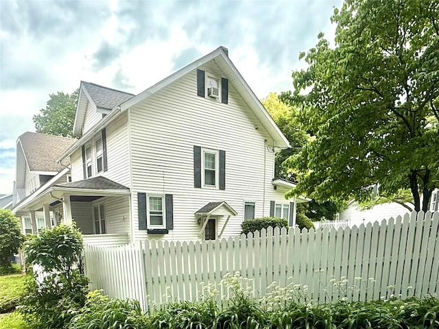 115 W 32nd St, Erie, PA 16508 - view of side of home with roof with shingles