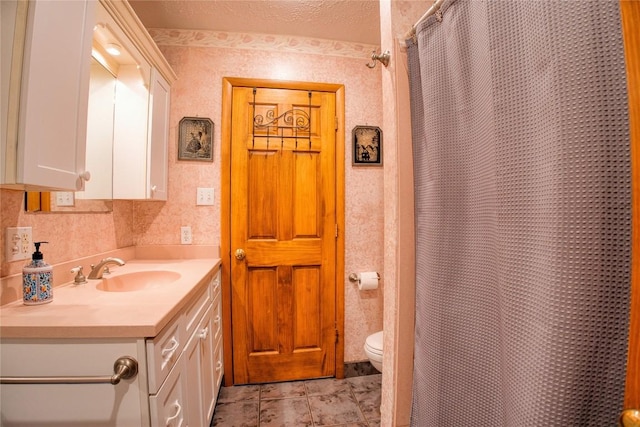 23186 Hatchtown Rd, Spartansburg, PA 16434 - full bathroom with wallpapered walls, toilet, vanity, and a shower with shower curtain