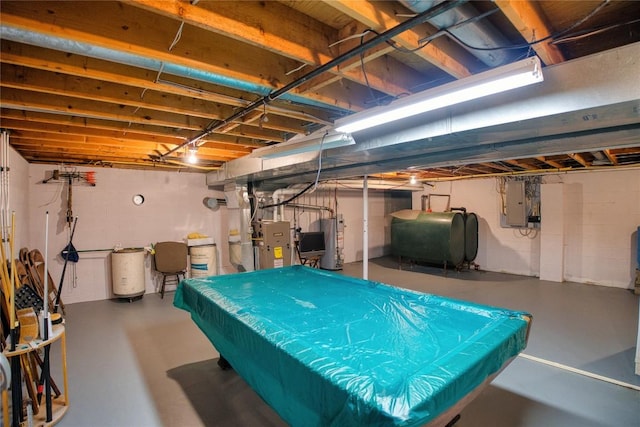 23186 Hatchtown Rd, Spartansburg, PA 16434 - unfinished below grade area featuring heating fuel, water heater, pool table, electric panel, and heating unit