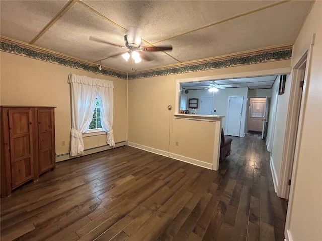 10689 Glenn Blvd, Conneaut Lake, PA 16316 - empty room featuring ceiling fan, dark wood-style flooring, a baseboard heating unit, a textured ceiling, and crown molding