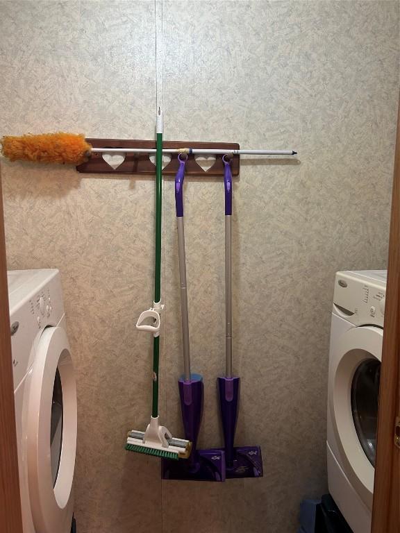 laundry room featuring independent washer and dryer