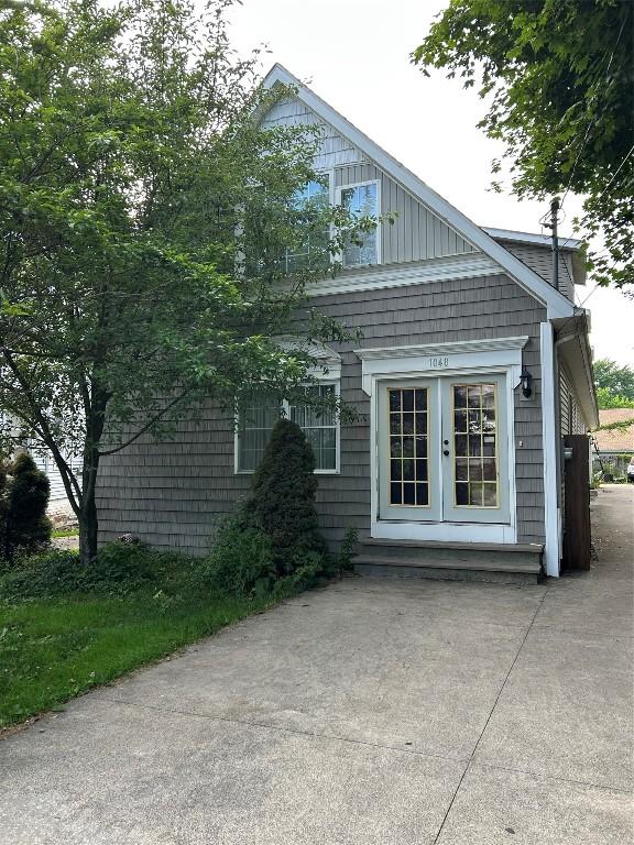1048 W 6th St, Erie, PA 16507 - rear view of property with french doors