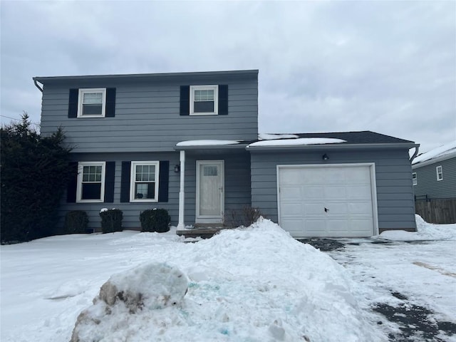 view of front of property with a garage