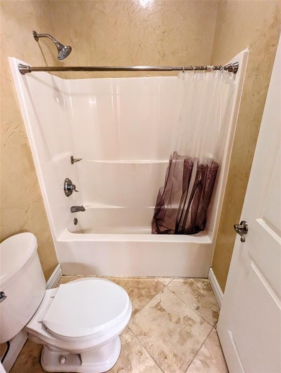 bathroom with toilet and shower / bathtub combination with curtain