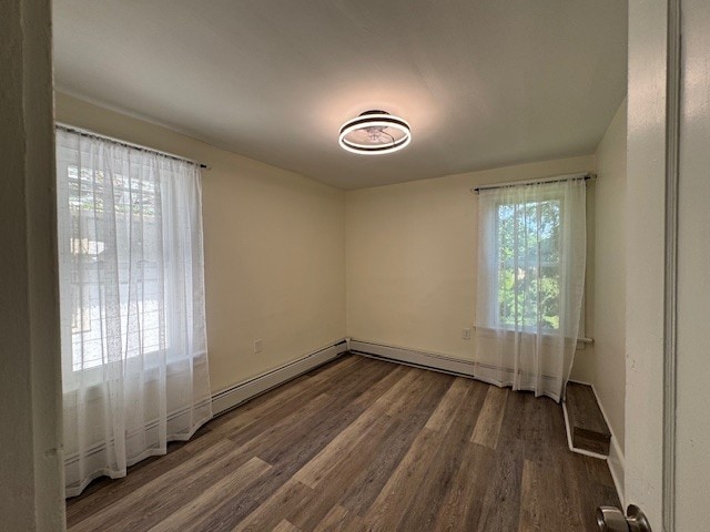 334 E 28th St, Erie, PA 16504 - unfurnished room with wood finished floors and baseboards
