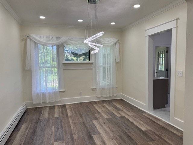 334 E 28th St, Erie, PA 16504 - unfurnished dining area featuring a baseboard heating unit, crown molding, a chandelier, wood finished floors, and recessed lighting