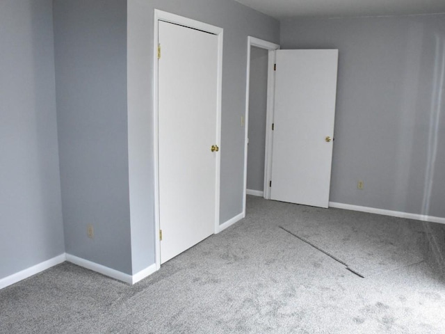 spare room featuring carpet