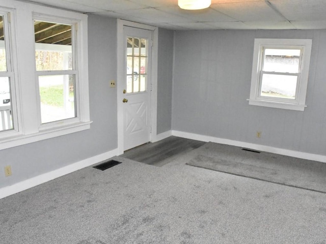 interior space with dark colored carpet