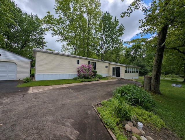 8734 Colonial Ln, Linesville, PA 16424 - manufactured / mobile home with an outbuilding and a front lawn