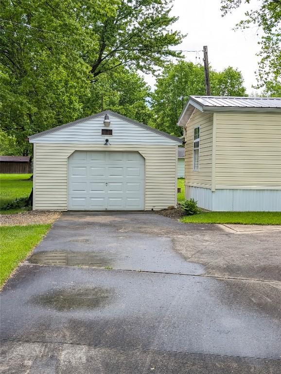 8734 Colonial Ln, Linesville, PA 16424 - detached garage with asphalt driveway