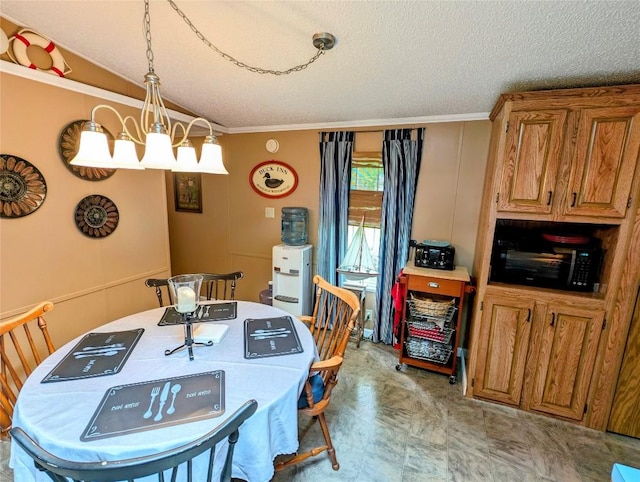 8734 Colonial Ln, Linesville, PA 16424 - dining room featuring a textured ceiling, crown molding, and a chandelier