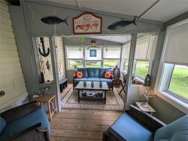 8734 Colonial Ln, Linesville, PA 16424 - sunroom with wood-type flooring, an outdoor hangout area, and vaulted ceiling