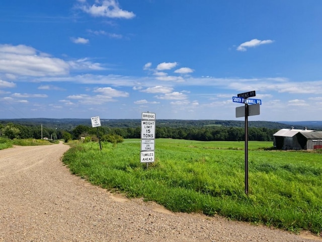 view of road featuring a rural view