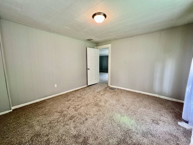3624 Buffalo Rd, Erie, PA 16510 - unfurnished room featuring carpet floors, wooden walls, and baseboards