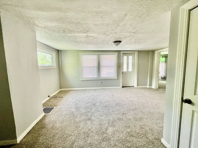 3624 Buffalo Rd, Erie, PA 16510 - carpeted spare room with baseboards and a textured ceiling