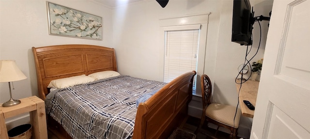 bedroom featuring crown molding