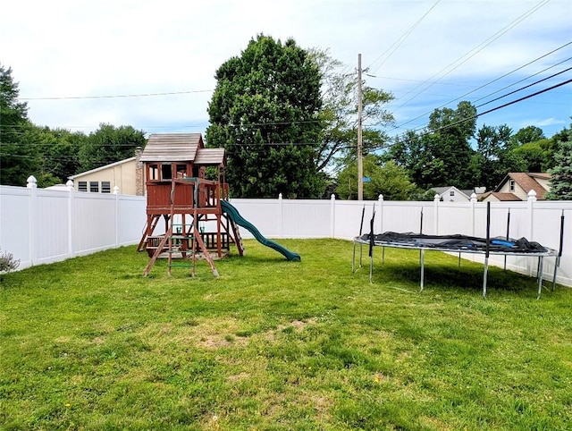 732 Walbridge Rd, Erie, PA 16511 - fenced backyard with a playground and a trampoline