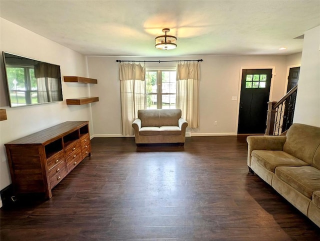 732 Walbridge Rd, Erie, PA 16511 - living room featuring healthy amount of natural light, dark wood-style flooring, and stairs
