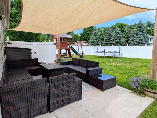 732 Walbridge Rd, Erie, PA 16511 - fenced backyard with outdoor lounge area, a patio, a trampoline, and a playground