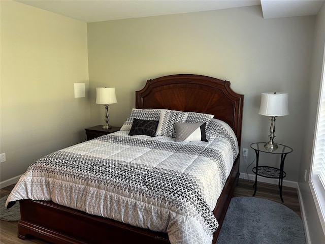 bedroom featuring hardwood / wood-style floors