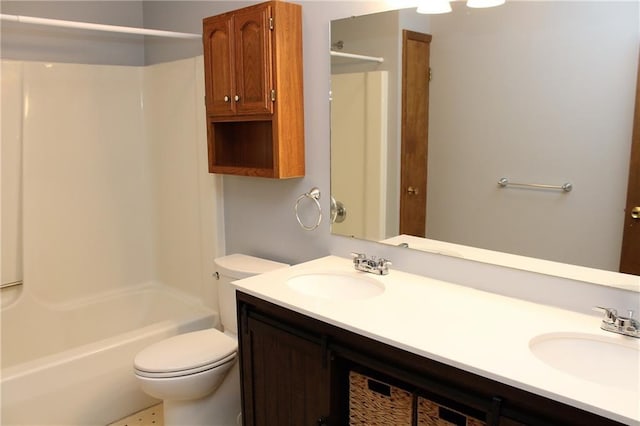 full bathroom with shower / bath combination, toilet, a sink, and double vanity