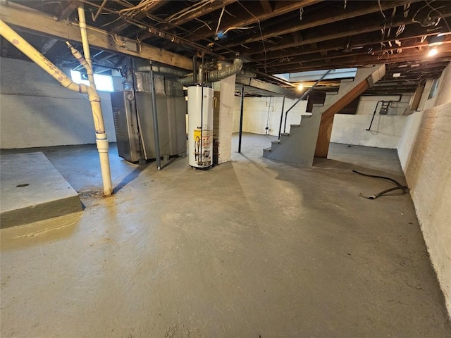 963 W 7th St, Erie, PA 16502 - unfinished below grade area with water heater and stairs