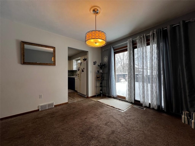 unfurnished room with light colored carpet