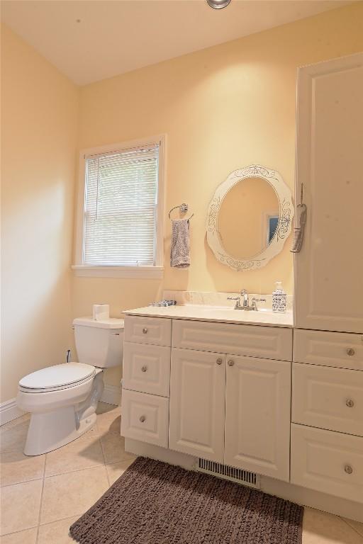 8280 Shore Dr, Fairview, PA 16415 - half bathroom featuring vanity and tile patterned floors