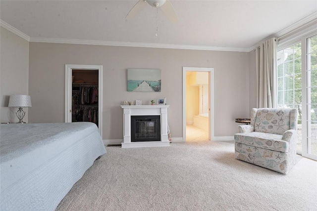 8280 Shore Dr, Fairview, PA 16415 - bedroom featuring ornamental molding, carpet flooring, a glass covered fireplace, a spacious closet, and access to outside