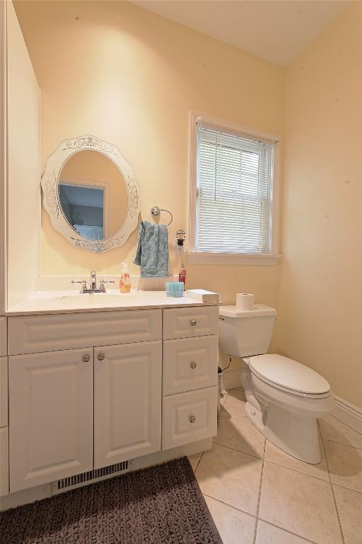 8280 Shore Dr, Fairview, PA 16415 - half bath with vanity and tile patterned floors